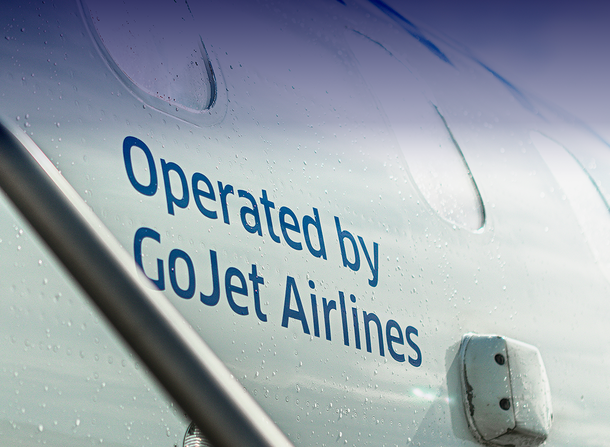 Text on side of aircraft saying 'Operated by GoJet Airlines'